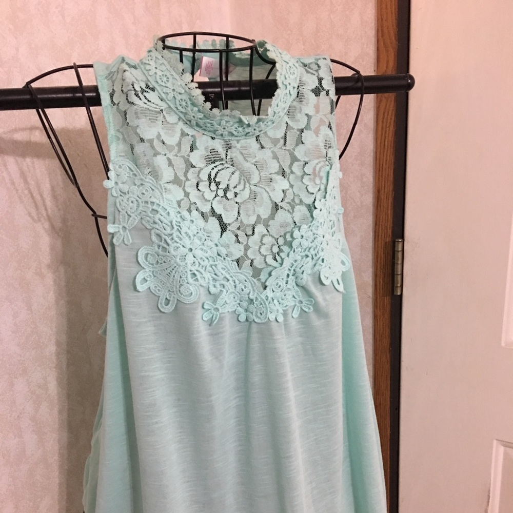 Plus Size sleeveless high neck halter top.